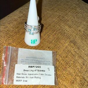 Bomb Party Dreaming of Sparkle Aquamarine Cubic Zirconia Ring with Rhodium